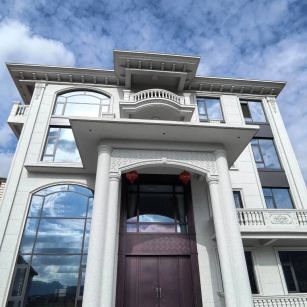 莆田白麻别墅外墙干挂石材效果示例