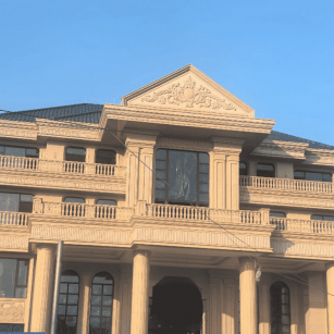 莆田黄金麻别墅外墙干挂石材效果示例