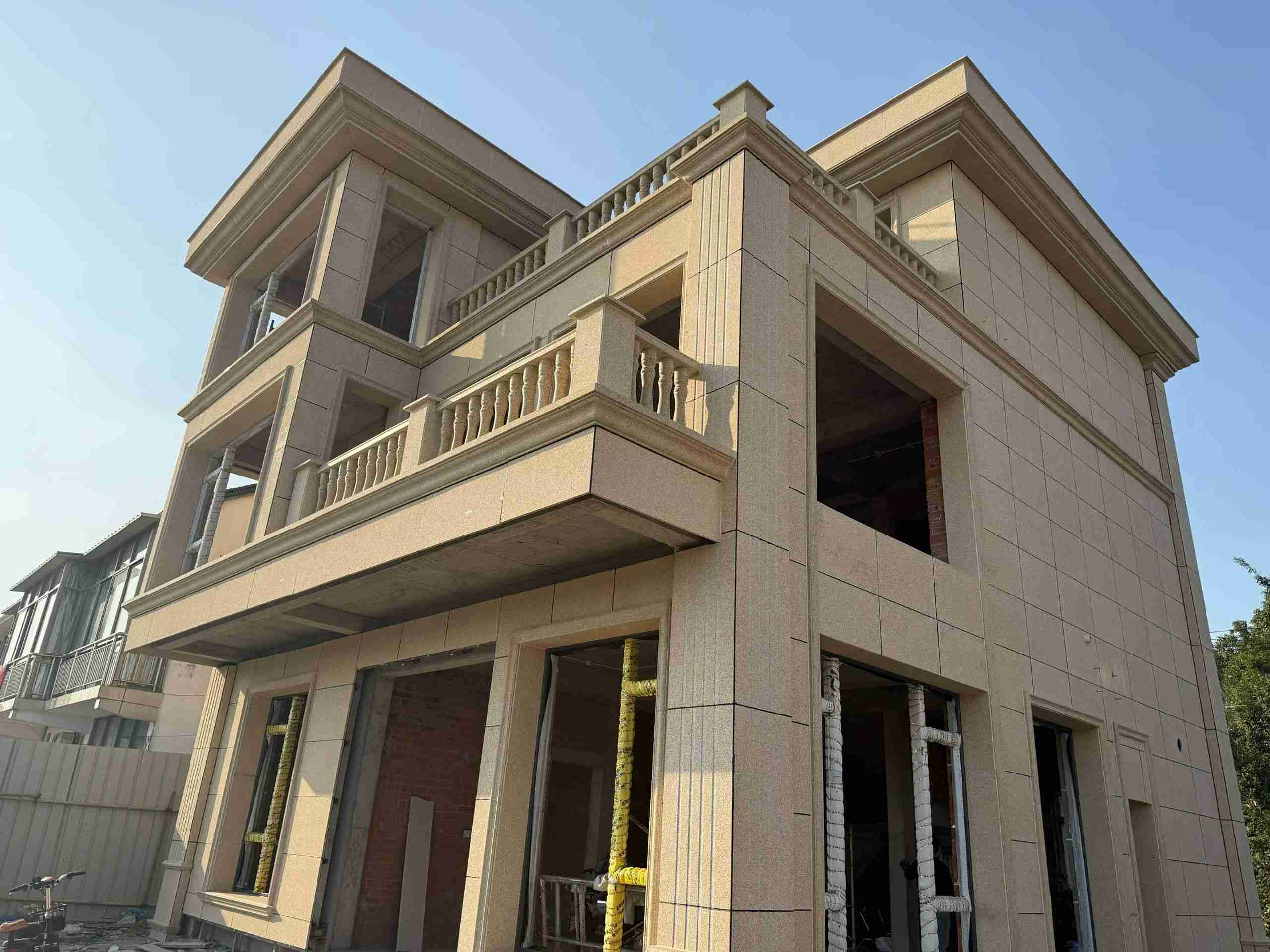 莆田 黄金麻花岗岩石材荔枝面外墙干挂效果展示